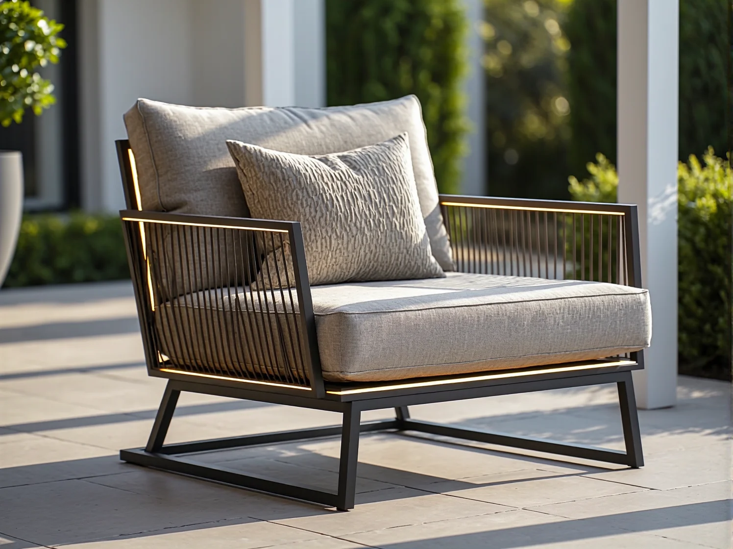 Nowoczesne oświetlenie LED zintegrowane z meblami na tarasie, podkreślające styl glamour.